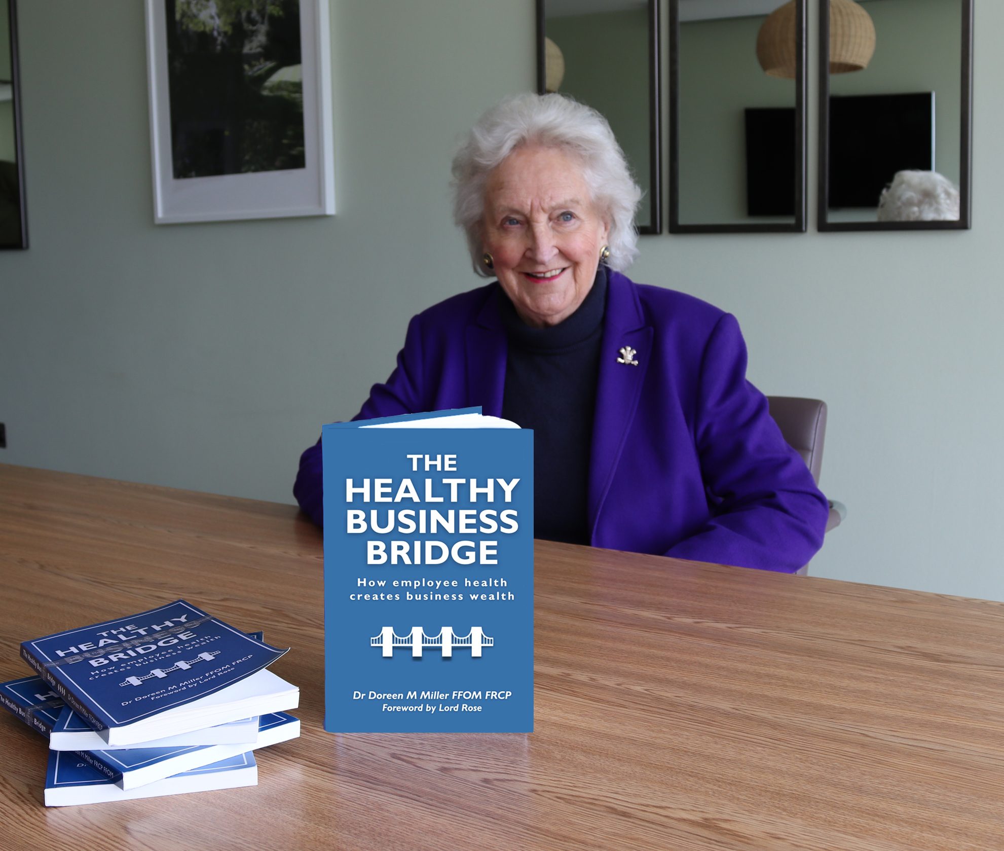 Dr Doreen Miller with her Book